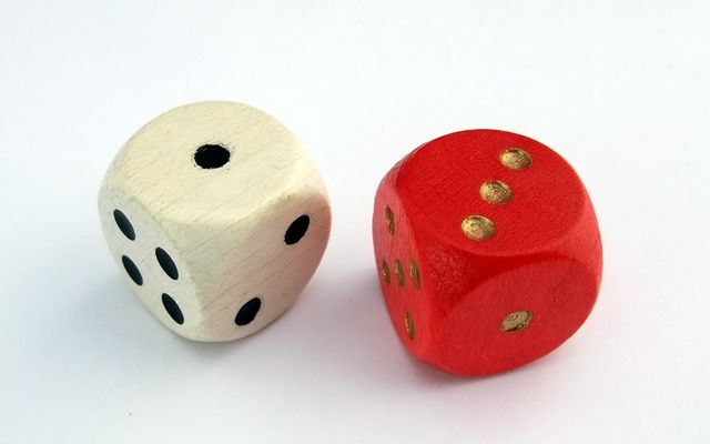 Six-sided dice on a table